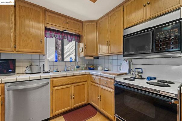 Interior, Kitchen, Tile Countertops, Wood Texture Flooring
