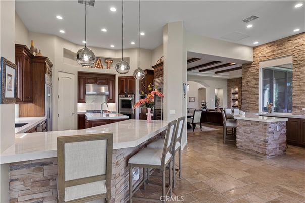 Interior, Kitchen, Pendant Lights, Recessed Lighting, Stainless Steel Appliances, Stone Walls, Wooden Beams