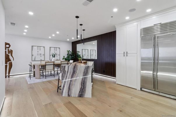 Dining room, Interior, Kitchen, Pendant Lights, Recessed Lighting, Stainless Steel Appliances, Wood Texture Flooring