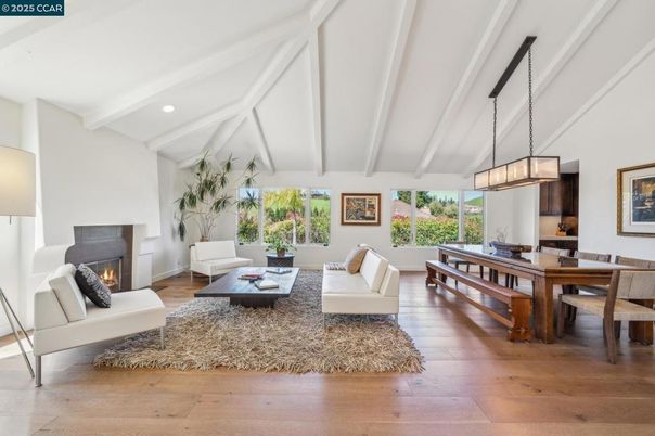 Dining room, Fireplace, Interior, Living room, Pendant Lights, Recessed Lighting, Wood Texture Flooring