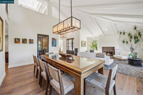Dining room, Fireplace, Interior, Living room, Pendant Lights, Recessed Lighting, Wood Texture Flooring