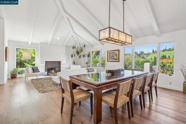 Dining room, Fireplace, Interior, Living room, Pendant Lights, Recessed Lighting, Wood Texture Flooring