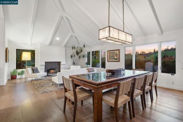 Dining room, Fireplace, Interior, Living room, Pendant Lights, Recessed Lighting, Wood Texture Flooring