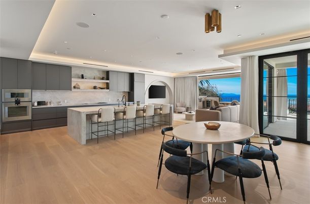 Dining room, Interior, Kitchen, Recessed Lighting, Stainless Steel Appliances, Water, Wood Texture Flooring