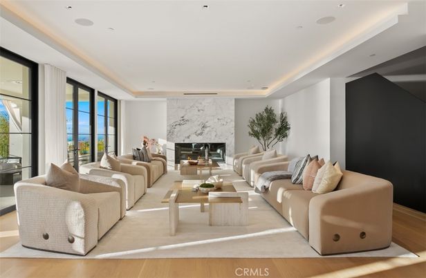 Fireplace, Interior, Living room, Marble Walls, Recessed Lighting, Wood Texture Flooring