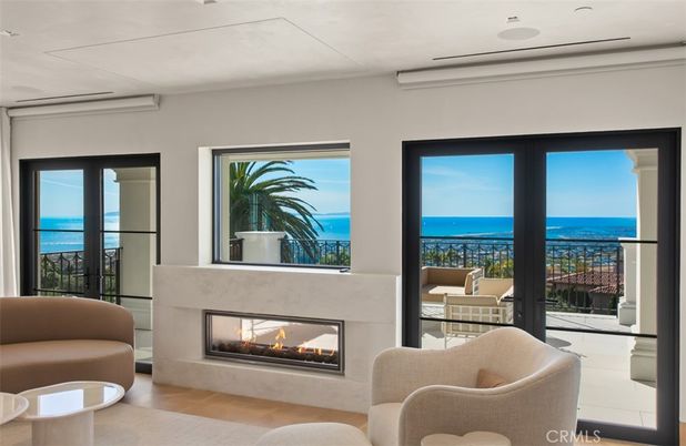Fireplace, Interior, Living room, Recessed Lighting, Water, Wood Texture Flooring