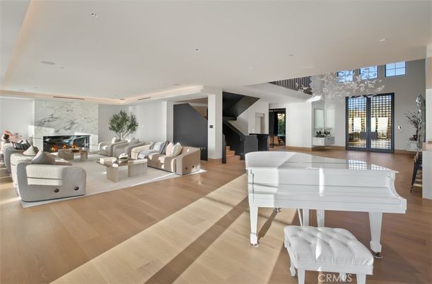 Fireplace, Interior, Living room, Piano, Recessed Lighting, Wood Texture Flooring