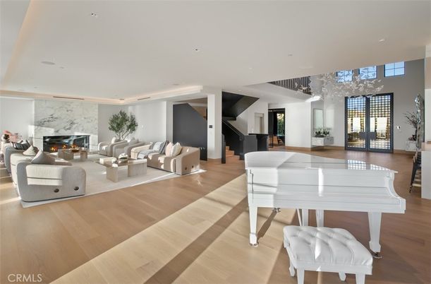 Fireplace, Interior, Living room, Piano, Recessed Lighting, Wood Texture Flooring
