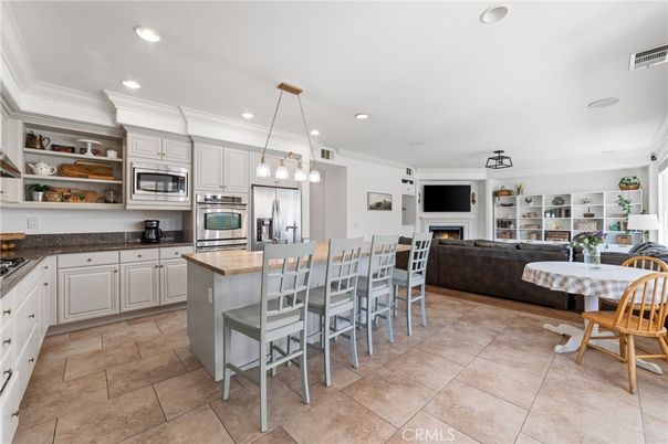 Fireplace, Interior, Kitchen, Living room, Pendant Lights, Recessed Lighting, Stainless Steel Appliances