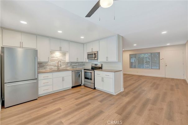 Interior, Kitchen, Recessed Lighting, Stainless Steel Appliances, Wood Texture Flooring