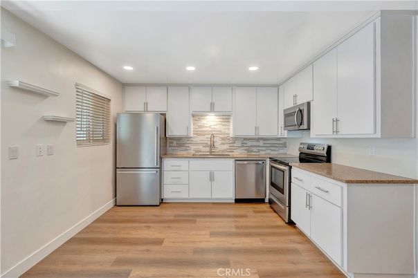 Interior, Kitchen, Recessed Lighting, Stainless Steel Appliances, Wood Texture Flooring