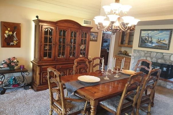Chandelier, Dining room, Fireplace, Interior