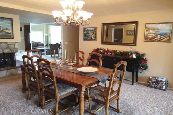Chandelier, Dining room, Fireplace, Interior, Living room
