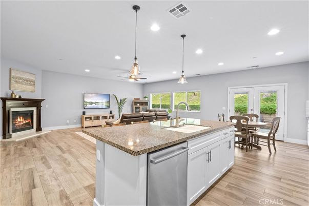 Dining room, Fireplace, Interior, Kitchen, Living room, Pendant Lights, Recessed Lighting, Wood Texture Flooring
