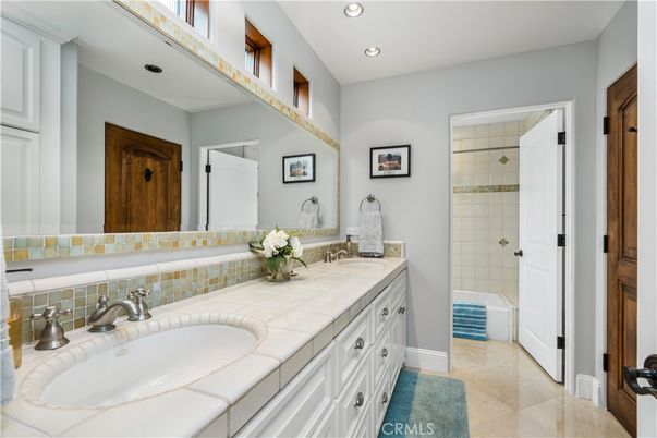 Bathroom, Dual Sink Vanities, Interior, Recessed Lighting, Tile Countertops