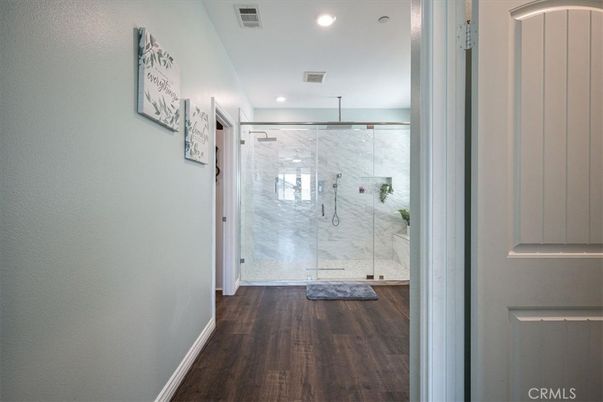 Bathroom, Glass Shower, Interior, Marble Walls, Recessed Lighting, Wood Texture Flooring