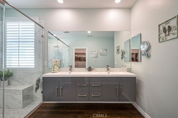 Bathroom, Dual Sink Vanities, Glass Shower, Interior, Recessed Lighting, Wood Texture Flooring