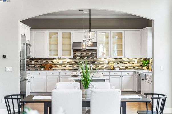 Dining room, Interior, Kitchen, Pendant Lights, Stainless Steel Appliances, Wood Texture Flooring