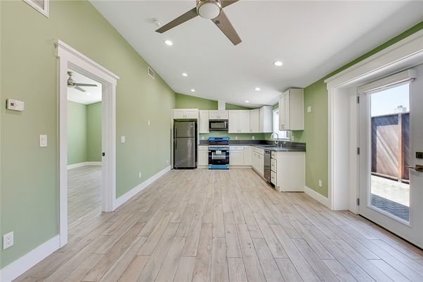 Interior, Kitchen, Recessed Lighting, Stainless Steel Appliances, Wood Texture Flooring