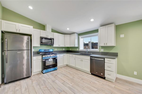 Interior, Kitchen, Recessed Lighting, Stainless Steel Appliances, Wood Texture Flooring