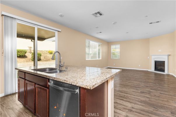 Fireplace, Interior, Kitchen, Recessed Lighting, Wood Texture Flooring