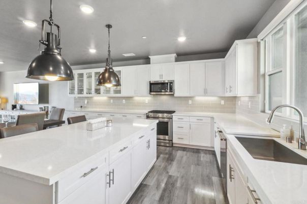 Interior, Kitchen, Pendant Lights, Recessed Lighting, Stainless Steel Appliances, Wood Texture Flooring