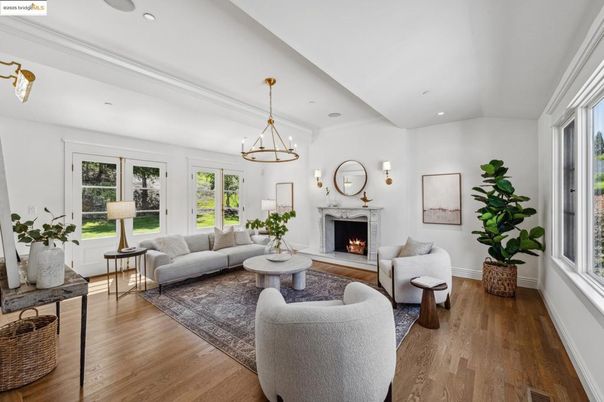 Chandelier, Fireplace, Interior, Living room, Pendant Lights, Recessed Lighting, Wood Texture Flooring
