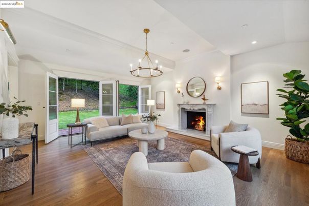 Chandelier, Fireplace, Interior, Living room, Recessed Lighting, Wood Texture Flooring