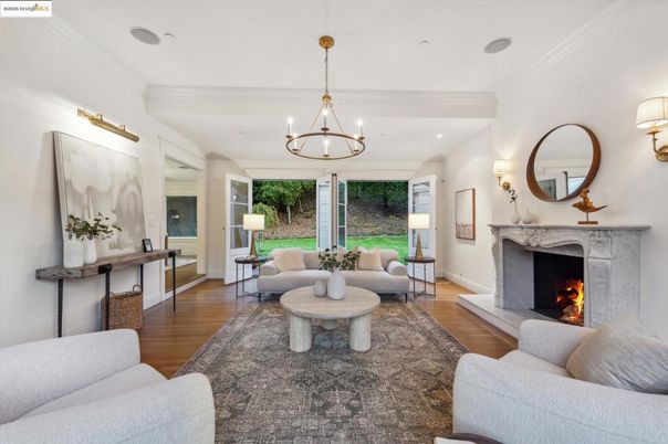 Chandelier, Fireplace, Interior, Living room, Recessed Lighting, Wood Texture Flooring