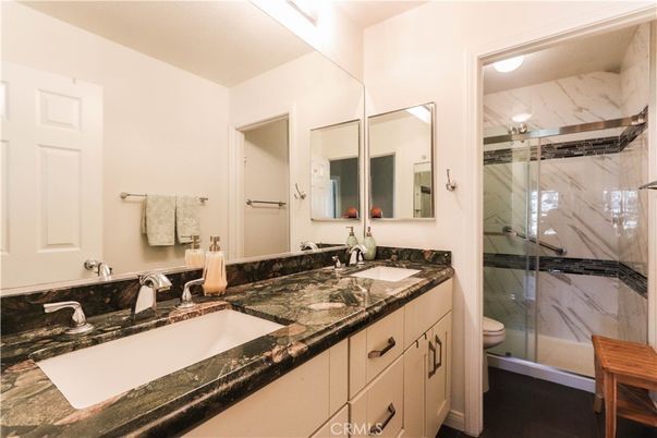Bathroom, Dual Sink Vanities, Glass Shower, Interior, Marble Walls