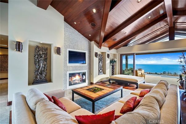 Fireplace, Interior, Living room, Recessed Lighting, Stone Walls, Water, Wooden Beams, Wooden Ceilings