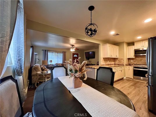Dining room, Interior, Kitchen, Living room, Pendant Lights, Recessed Lighting, Stainless Steel Appliances, Wood Texture Flooring