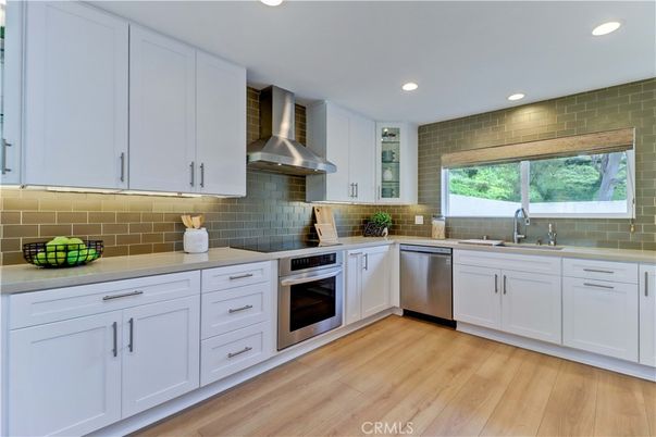 Interior, Kitchen, Recessed Lighting, Stainless Steel Appliances, Stone Walls, Wood Texture Flooring