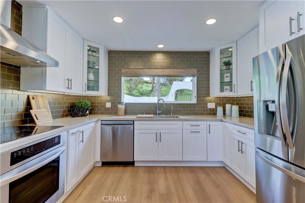 Interior, Kitchen, Recessed Lighting, Stainless Steel Appliances, Wood Texture Flooring