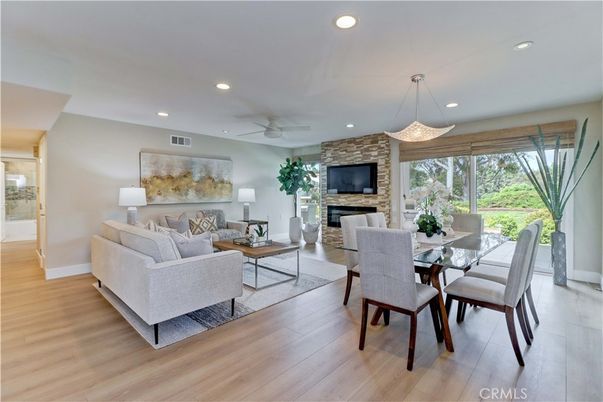Dining room, Fireplace, Interior, Living room, Pendant Lights, Recessed Lighting, Stone Walls, Wood Texture Flooring