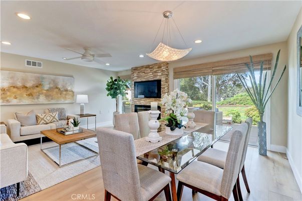 Dining room, Fireplace, Interior, Living room, Pendant Lights, Recessed Lighting, Stone Walls, Wood Texture Flooring