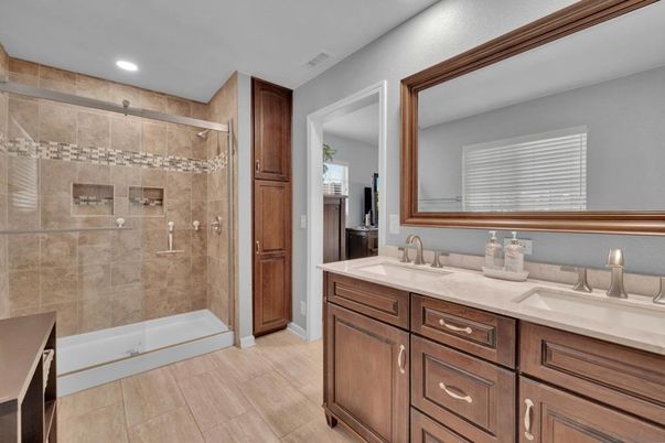 Bathroom, Dual Sink Vanities, Glass Shower, Interior, Recessed Lighting, Wood Texture Flooring