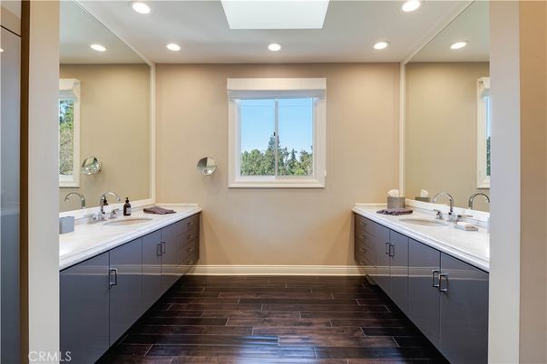 Bathroom, Dual Sink Vanities, Interior, Recessed Lighting, Wood Texture Flooring