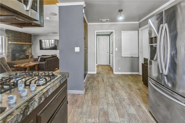 Dining room, Fireplace, Interior, Kitchen, Wood Texture Flooring
