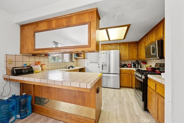 Interior, Kitchen, Tile Countertops, Wood Texture Flooring