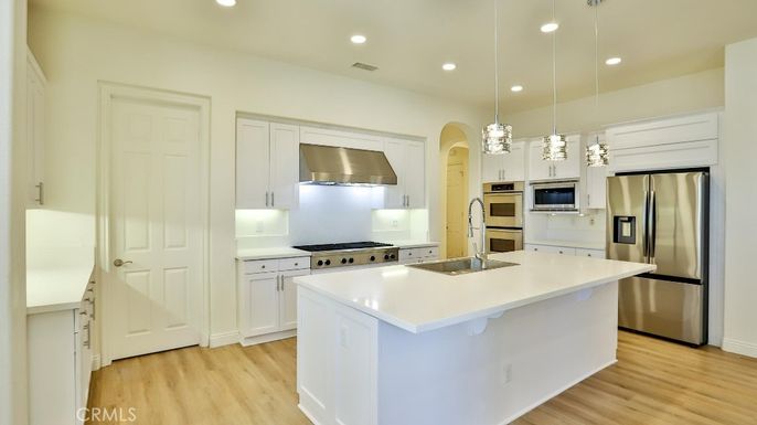 Interior, Kitchen, Pendant Lights, Recessed Lighting, Stainless Steel Appliances, Wood Texture Flooring