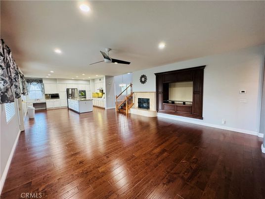 Empty room, Fireplace, Interior, Kitchen, Recessed Lighting, Wood Texture Flooring