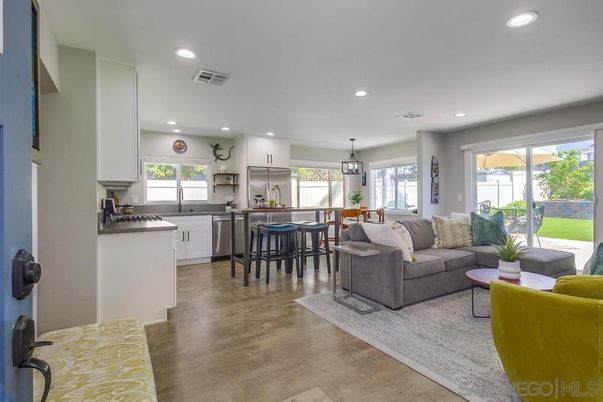 Dining room, Interior, Kitchen, Living room, Pendant Lights, Recessed Lighting, Stainless Steel Appliances, Wood Texture Flooring