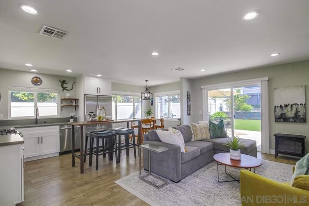 Dining room, Interior, Kitchen, Living room, Pendant Lights, Recessed Lighting, Stainless Steel Appliances, Wood Texture Flooring