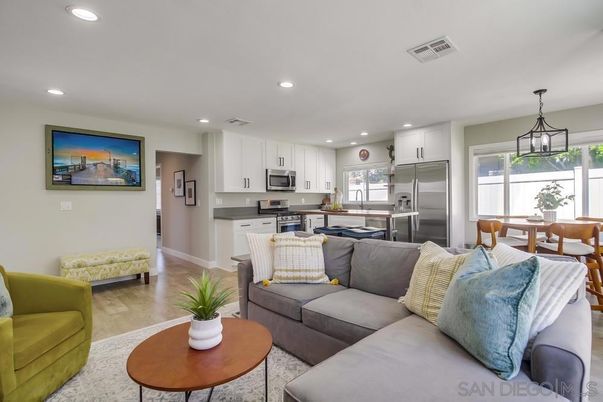 Dining room, Interior, Kitchen, Living room, Pendant Lights, Recessed Lighting, Stainless Steel Appliances, Wood Texture Flooring