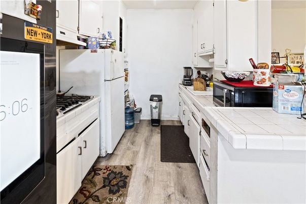 Interior, Kitchen, Tile Countertops, Wood Texture Flooring