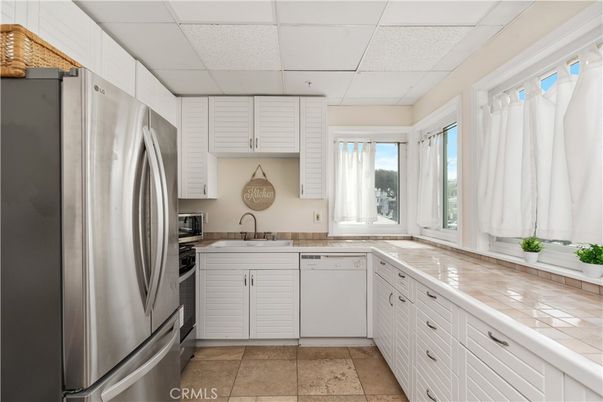 Interior, Kitchen, Stainless Steel Appliances, Tile Countertops