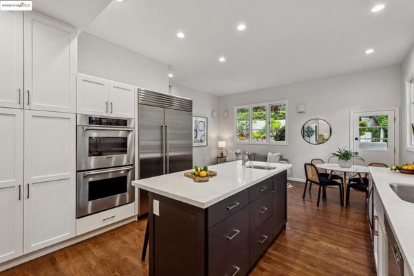 Dining room, Interior, Kitchen, Recessed Lighting, Stainless Steel Appliances, Wood Texture Flooring