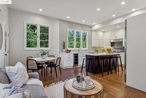 Dining room, Interior, Kitchen, Recessed Lighting, Stainless Steel Appliances, Wood Texture Flooring