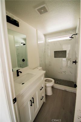 Bathroom, Glass Shower, Interior, Marble Walls, Wood Texture Flooring